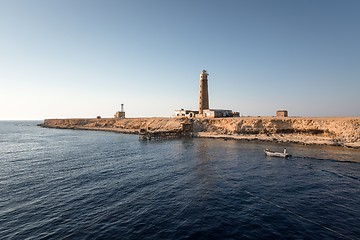 Image showing Tall lighthouse on the sea