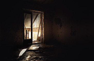 Image showing Abandoned hallway with light at the end
