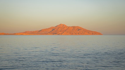 Image showing land over the horizon under blue sky