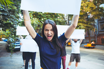 Image showing Group of protesting young people outdoors