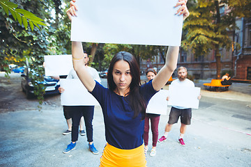 Image showing Group of protesting young people outdoors