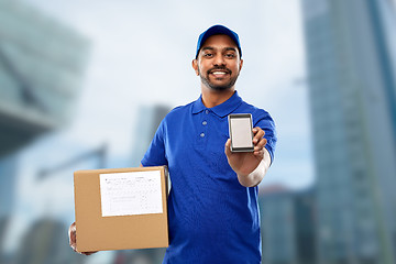 Image showing indian delivery man with smartphone and parcel box