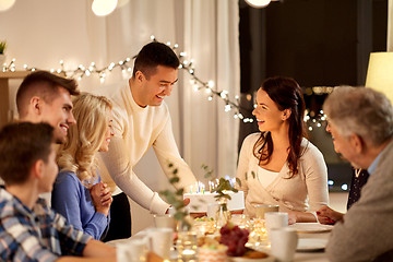 Image showing happy family having birthday party at home