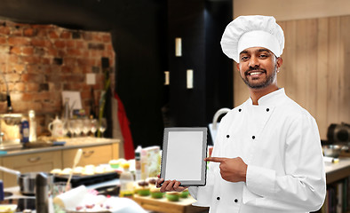 Image showing happy indian chef with tablet computer at kitchen