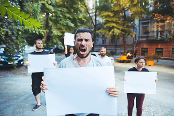 Image showing Group of protesting young people outdoors