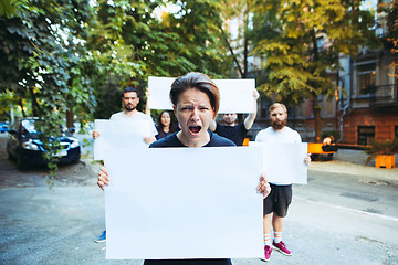 Image showing Group of protesting young people outdoors