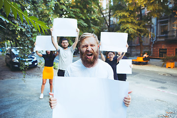 Image showing Group of protesting young people outdoors