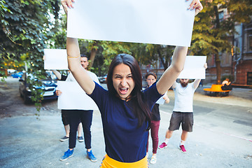 Image showing Group of protesting young people outdoors