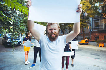 Image showing Group of protesting young people outdoors