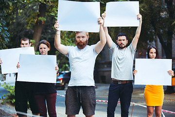 Image showing Group of protesting young people outdoors