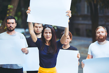 Image showing Group of protesting young people outdoors