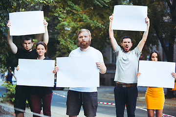Image showing Group of protesting young people outdoors