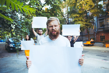 Image showing Group of protesting young people outdoors