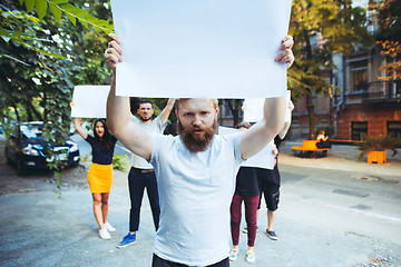 Image showing Group of protesting young people outdoors