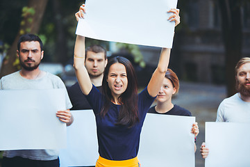 Image showing Group of protesting young people outdoors