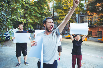 Image showing Group of protesting young people outdoors