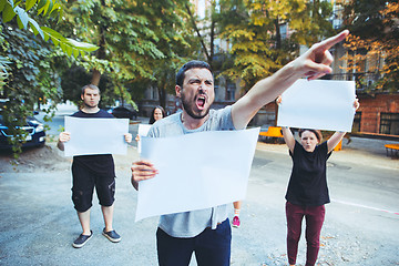 Image showing Group of protesting young people outdoors