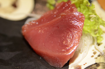 Image showing Tuna sashimi cutting raw blue fin tuna