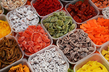 Image showing Asseorted dried fruits and candy