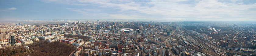 Image showing KIEV, UKRAINE - April 06, 2018: Panoramic view of the city of Kiev with the stadium and university against the sky. Aerial view from the drone