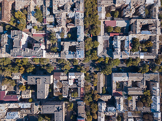 Image showing Aerial photography with drone on the street, rooftops and roads with cars on a sunny day. Ukraine, Odessa