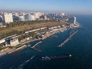 Image showing Natural landscape with costline of city Odesa, Ukraine. Seascape with sandy beach and blue water. Aerial view from drone.