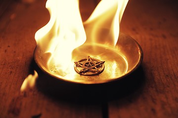 Image showing Old pentagram burning in flames