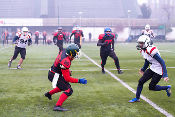 Image showing training match of professional american football players