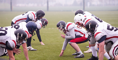 Image showing professional american football players ready to start