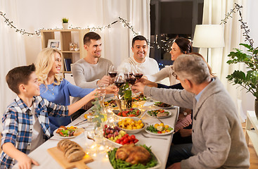 Image showing happy family having dinner party at home