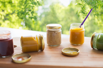 Image showing vegetable or fruit puree or baby food in jars