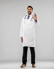 Image showing smiling indian male doctor showing ok gesture