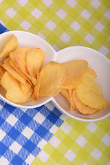 Image showing Close up potato chips. top view background