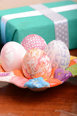 Image showing Arrangement of Gift Boxes and Decorated Easter Eggs