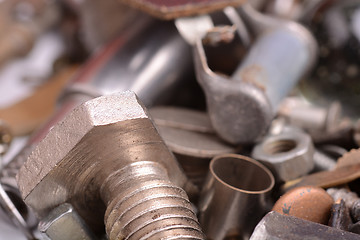 Image showing old rusty screw,nuts and bolt with vintage style, close up