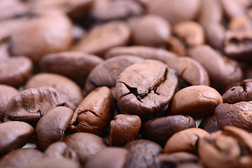 Image showing Roasted coffee bean close up. Food background