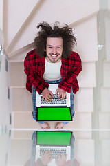 Image showing freelancer in bathrobe working from home