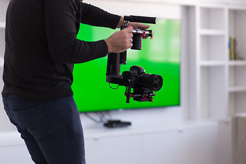 Image showing videographer at work