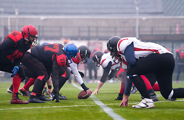 Image showing professional american football players ready to start