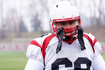 Image showing portrait of young confident American football player