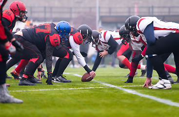 Image showing professional american football players ready to start