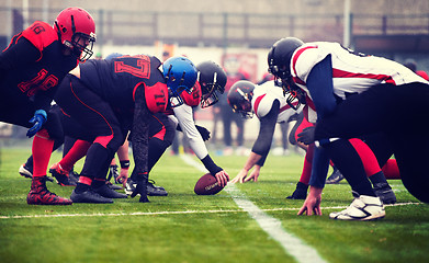 Image showing professional american football players ready to start