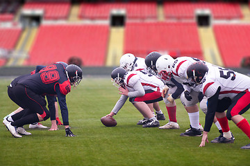 Image showing professional american football players ready to start