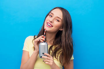 Image showing young woman or teenage girl drinking soda from can