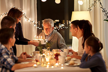 Image showing happy family having birthday party at home