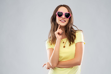 Image showing teenage girl in heart-shaped sunglasses