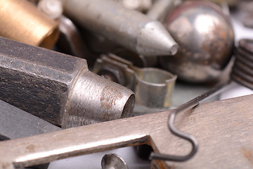 Image showing old rusty screw,nuts and bolt with vintage style, close up