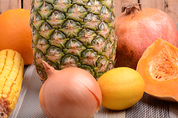 Image showing collection of fruit and vegetables. Pineapple, lemon, grapefruit, onion, corn, pumpkin, orange
