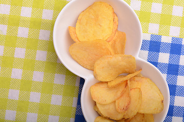 Image showing Close up potato chips. top view background