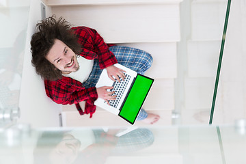 Image showing freelancer in bathrobe working from home